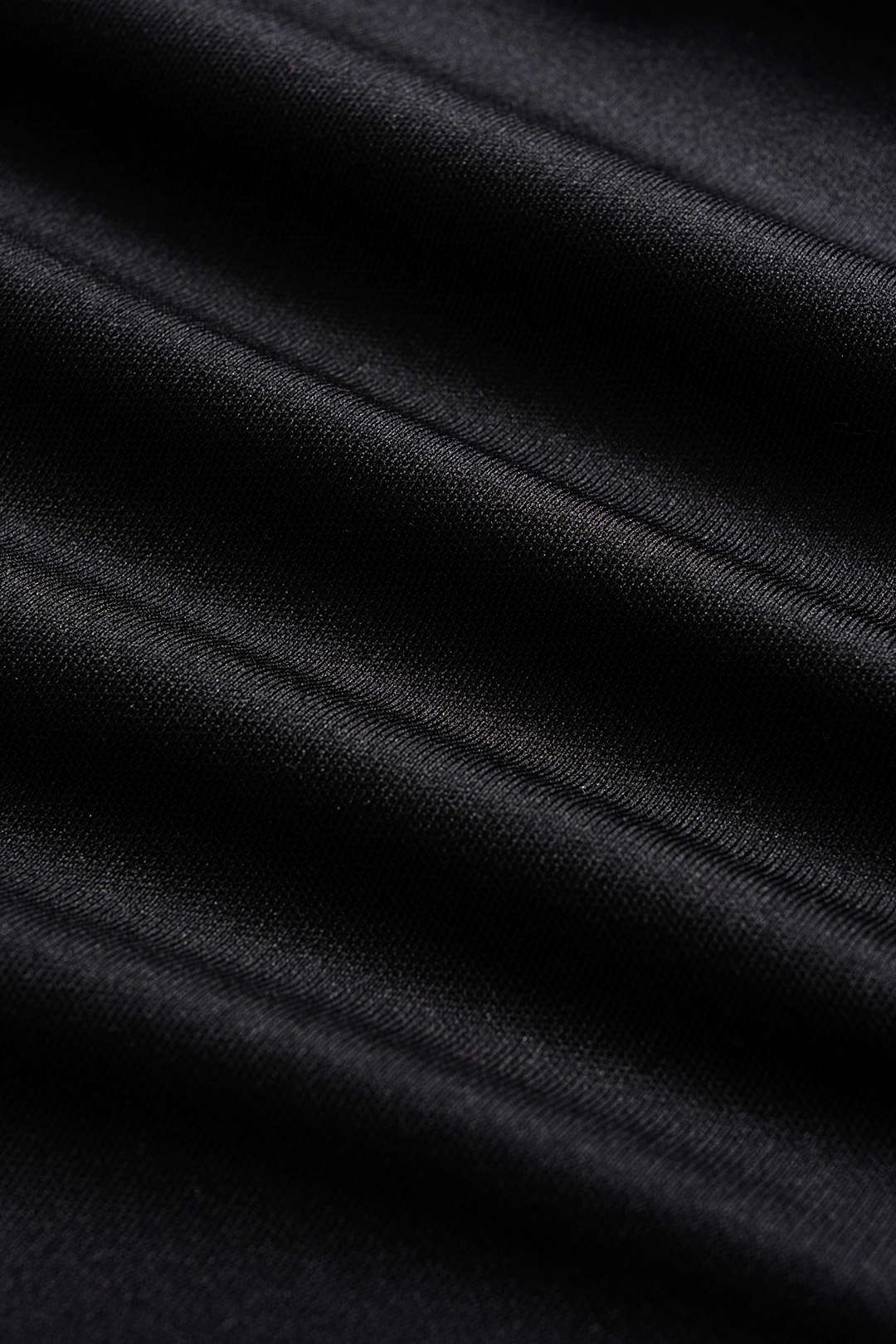 ONYX | ASYMMETRICAL BUCKLE HALTER TOP