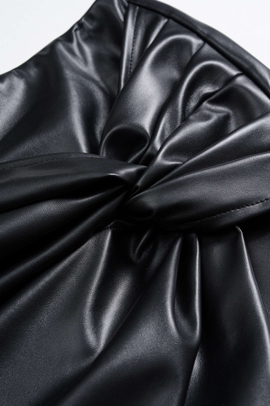 NOIRÉ | DRAPED LEATHER MINI SKIRT