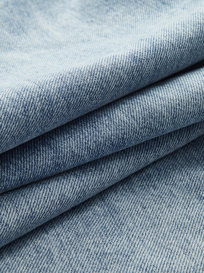 ROMA | ASYMMETRIC WAIST WIDE LEG JEANS LIGHT WASH BLUE