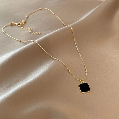 NOIR PENDANT NECKLACE