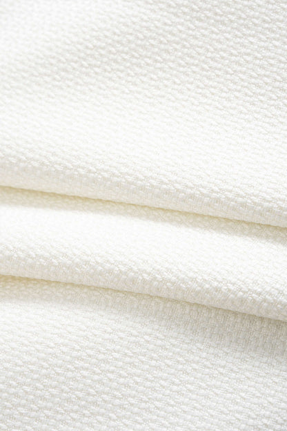 CAROLA | CROPPED BUTTON TOP IVORY